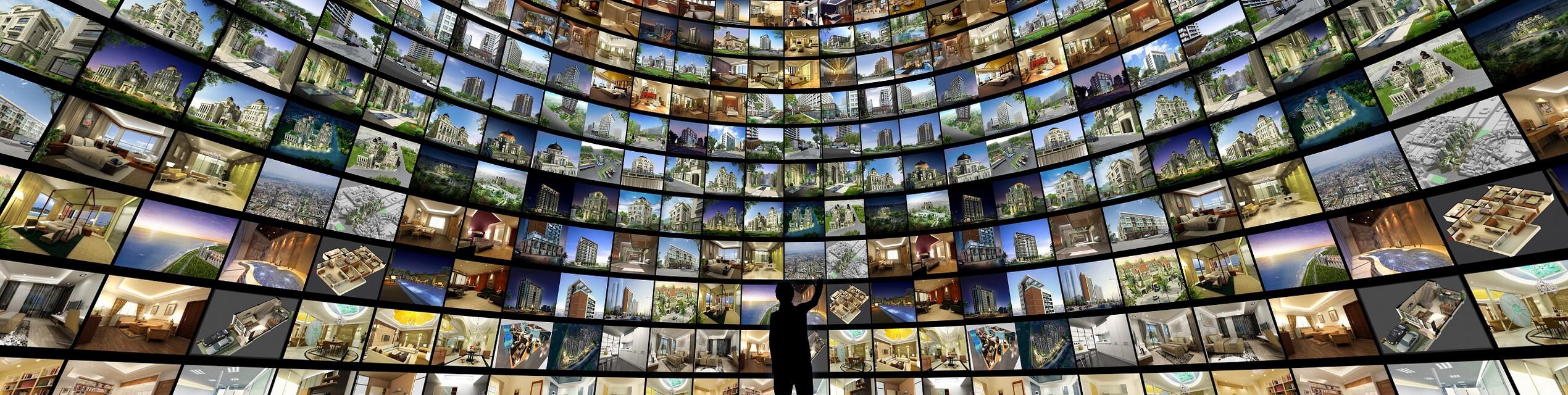 Mann in Raum voller Bildschirme